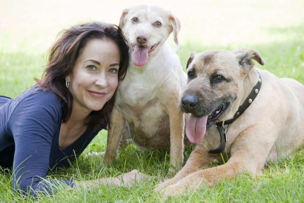 Stella & Chewy's founder, Marie Moody, next to her mixed breed dogs, Stella and Chewy